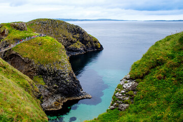 View from Carrick-a-Rede Rope Bridge, famous rope bridge near Ballintoy in County Antrim, Northern...