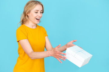 Happy woman receive unexpected surprise, hold gift box