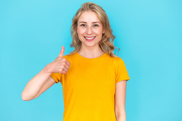 Happy woman showing thumb up gesture, approving freelance work offer