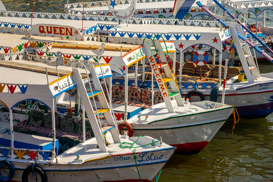 Close up of traditional coloful motorboats ferries on the Nile river, Luxor, Egypt