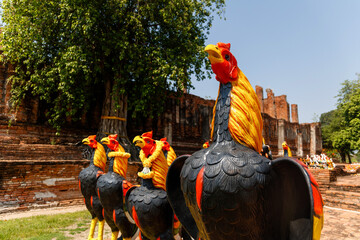 Chicken and other statue for worship at the temple