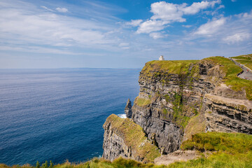 Spectacular Cliffs of Moher are sea cliffs located at the southwestern edge of the Burren region in...