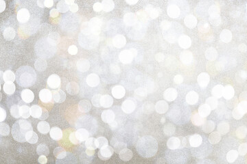 Shiny silver glitter as background. Bokeh effect