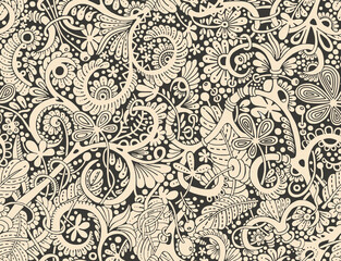 A hand-drawn floral pattern in gray tones.Seamless pattern.