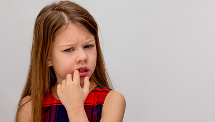 Child biting nails as concept of autoaggression