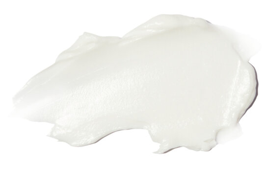 A smear of cream on a blank background.