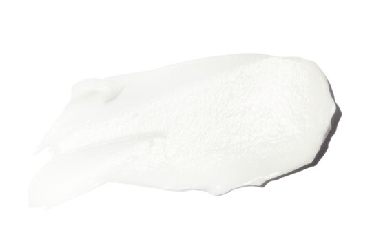 A smear of cream on a blank background.