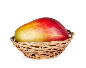 Mango fruit in basket isolated on a white background