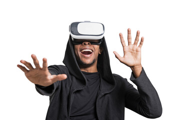 A man in a black hoodie using virtual reality headset, reacting with raised hands, isolated on...