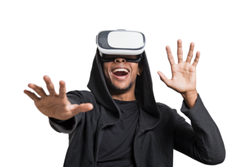 A man in a black hoodie using virtual reality headset, reacting with raised hands, isolated on white background, concept of technology