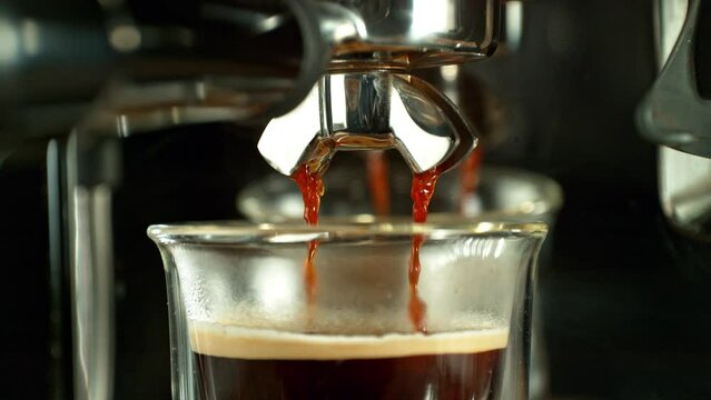 Super Slow Motion of Pouring Coffee from Coffee Maker. Filmed on high speed camera, 1000fps.