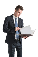 Man in a business suit reading an open folder, isolated on a white background, concept of corporate work