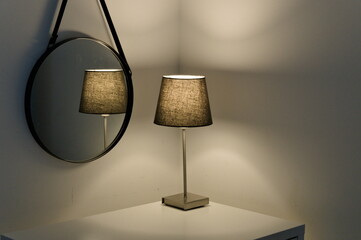 table lamp reflected in the mirror