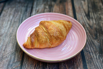 Crispy, fresh croissants, Concept of food, bakery, breakfast ideas, taste, freshness. Poser. Copy space for ad