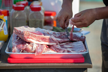 Cutting the barbecue meat