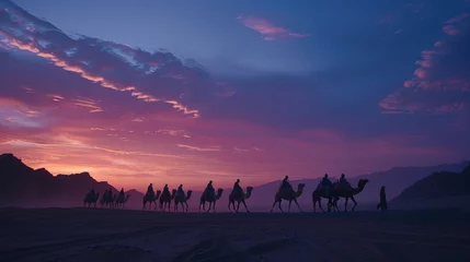 Foto op Plexiglas As twilight descends upon the desert, camels and their cameleers press on, their journey illuminated by the fading hues of sunset. © peerawat