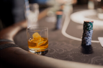 Drinks on a poker game table in late night