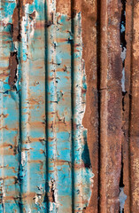 pattern rusty metal surface with remnants of blue paint