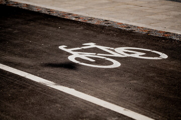 Cyclists road marking for bicycle lane on city pavement road