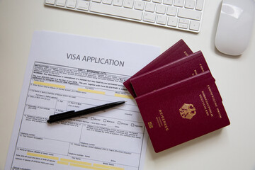 Close up of a visa application document with a German passport