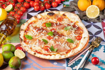 Pizza: A beloved Italian dish consisting of a round, flattened dough topped with tomato sauce, cheese, and various toppings such as pepperoni, mushrooms, and vegetables, baked in a hot oven until the 