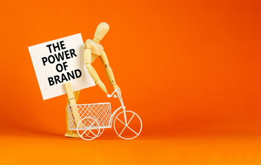 The power of brand symbol. Concept words The power of brand on beautiful white paper on clothespin....