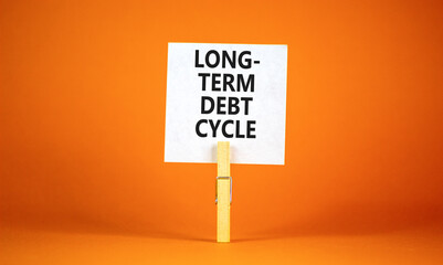Long-term debt cycle symbol. Concept words Long-term debt cycle on beautiful white paper on...