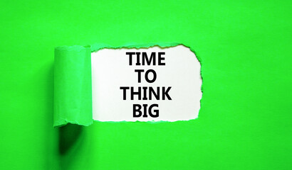 Time to think big symbol. Concept words Time to think big on beautiful white paper. Beautiful green background. Business and time to think big concept. Copy space.