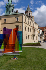 Multi-colored glass panes, modern art installation titled "Wyspia" by Kinga Nowak on Wawel Hill, Krakow, Poland