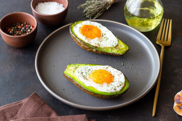 Avocado baked with egg. Healthy eating. Diet.