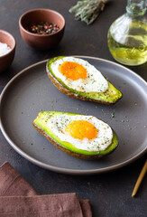 Avocado baked with egg. Healthy eating. Diet.