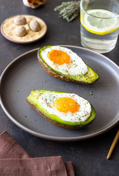 Avocado baked with egg. Healthy eating. Diet.