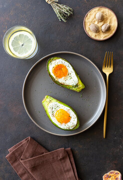 Avocado baked with egg. Healthy eating. Diet.