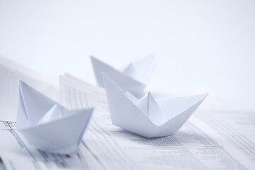 paper boats on the paper - 783064194