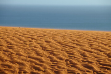 sand beach and deep sea