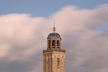 Fototapeta premium The tower of the Great Church in the city of Deventer, the Netherlands with a long exposure 