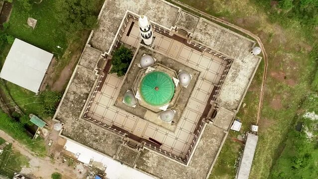 ISLAMABAD, PAKISTAN - APRIL 12 2024: Islamabad Hazrat Bari Imam Sarkar Shrine. Top Aerial View 