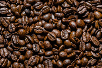 Brown coffee beans background. Coffee beans, top view. - 783080303