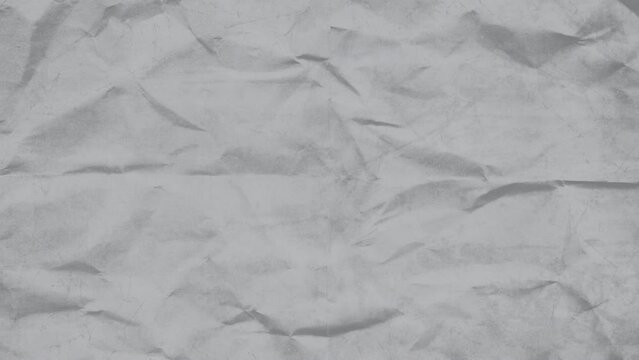 Stop motion animated grey paper texture background. Crumpled White Paper Looping Animation in 4k. Quick changing.