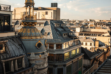 Rooftop view on residential buildings in Paris from Printemps Haussmann