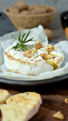 Fresh sliced Camembert cheese