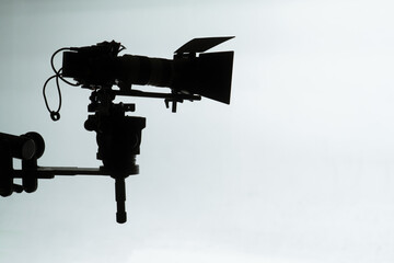 Silhouette of Professional Film Camera on Set