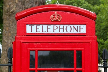 British telephone booth in London - 783096139