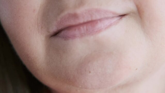 close up part face mature woman 55 years old, human fat neck, lower half face, wrinkles around mouth, sagging cheeks, sagging cheeks, injection cosmetology, correction surgery, antiaging procedures