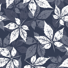 Seamless pattern with leaves. Indistinct silhouettes of white and gray falling leaves on a dark background. For fabric, packing paper, cover, wrapping, wallpaper.