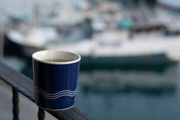 Morning Close-Up Tea in Mug, Sunrise Bokeh Overlooking Harbour Views in Taiwan
