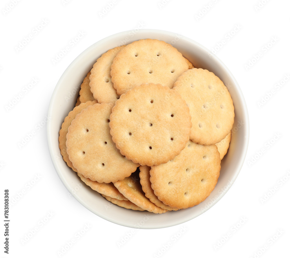 Wall mural tasty crackers in bowl isolated on white, top view