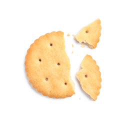 Crispy broken cracker isolated on white, top view