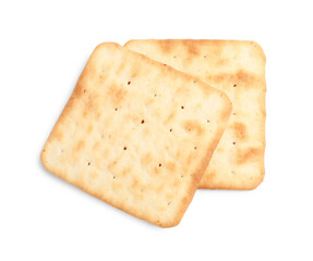 Tasty crispy square crackers isolated on white, top view