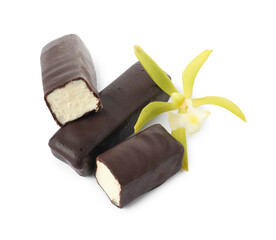 Glazed curd cheese bars and vanilla flower isolated on white